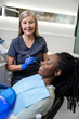 Young woman having a session of tooth treatment at the dentists