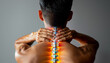 Back view of a man's body, focusing on the spine with the visible upper part of the backbone. The man is massaging his neck, indicating a point of pain. This image represents healthcare, body prophyla