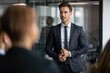 © ttonaorh - Businessman talking to colleagues during meeting in office. Business people having conversation at workplace. Teamwork concept