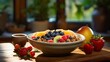 Breakfast bowl filled with Granola, Yogurt, fresh berries and nuts on top of a table