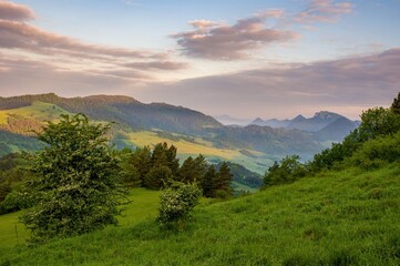 Sticker - Mountain pass in Pieniny in Poland. Beautiful, dynamic and hazy sky over the mountains. Slovakia and Poland countryside.Mountain hiking, healthy lifestyle. Spring Poland.