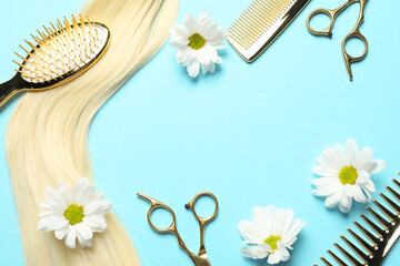 Wall Mural - Flat lay composition with professional hairdresser tools, flowers and blonde hair strand on light blue background