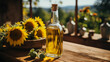 Sunflower oil in  glass bottle on wooden table against the background of farm fields