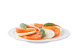 Caprese salad in a plate on a white isolated background