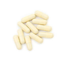 Sticker - Vitamin capsules isolated on white, top view. Health supplement