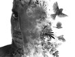 A black and white paintography portrait of a man merged with flying birds art