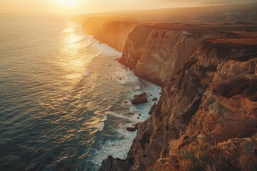 Wall Mural - Coastal Cliffs, Golden hour light on rugged cliffs, Cliffs overlooking the ocean, High-angle view, Warm tones of sunset, Golden hour before sunset