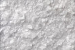 White salt flakes close up full frame as background