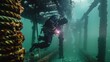 © BMMP Studio - Structural welder performing underwater welding to repair a damaged pier, surrounded by water and equipment.