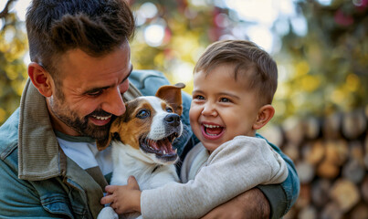 Candid shot of happy father and  son in the part with a new puppy dog. Fur baby growing up with toddler, snap shot, love