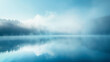 Softly diffusing smoke in a tranquil blue, gently enveloping the entire frame, suggesting the calm of an early morning fog over a lake.