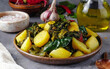 Blitva: traditional homestyle south Croatia dish made with boiled potatoes, swiss chard leaves, garlic, and olive oil.