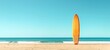 © Jafree - Surfboard erect on sandy beach under clear sky. Beachside surfboard. Concept of leisure sports, surf culture, coastal recreation, and sunny beach days. Copy space. Banner