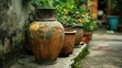 an old clay vase resting on a concrete ledge in an outdoor garden, surrounded by lush potted plants and small trees, exuding a timeless and serene ambiance.