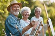 Vibrant senior citizens celebrate body positivity through an outdoor watercolor workshop amidst a lush garden