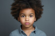 Portrait of a charming child with curly hair