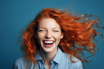 Poster - Joyful redhead woman with windblown hair