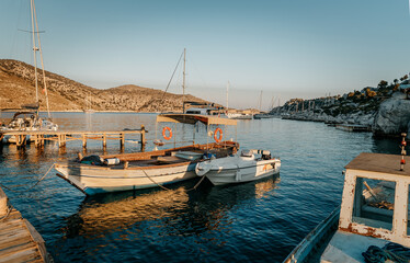 Wall Mural - Sailboats in the Harbor among Beautiful Mountains