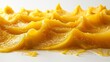 On a white background, yellow mango pulp is isolated