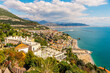 Panoramic view of the city of Vietri sul Mare. Palm trees, sea and mountains. The Amalfi coast of Italy
