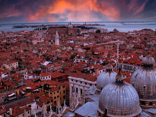 Wall Mural - Venice at sunset. Colorful town in Veneto in Italy Europe. Art and culture. Tourists from all over the world for Piazza San Marco to Grand Canal Rialto 