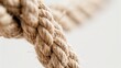 Close-up image of a rope under tension on a white background, representing pressure and strength
