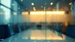 © Media Srock - Defocused board meeting background behind glass wall