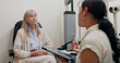 © peopleimages.com - Woman, optometrist and doctor with tablet for exam with patient in office with spectacles for insurance. Optometry, eye care and trust with vision, results or advice from specialist in healthcare