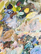 Colorful and textured artist's palette with thick oil paint