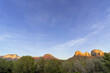 Landscape Image of Red Rock Mountains Against Blue Sky