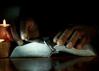 Wall Mural - praying to god with hands on bible with people stock image stock photo	