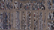 Top view of the electric vehicle transport yard and intercontinental shipping industry..