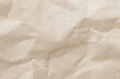 Old paper vintage texture surface for background. Recycle pale brown paper crumpled texture, Cream color recycled kraft paper texture blank with copy space for text.