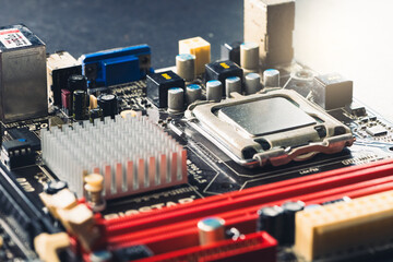 Wall Mural - The technician is putting the CPU on the socket of the computer motherboard.