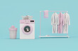 Modern washing machine and Bathrobe set in pink color on rack. Soft classic clothes for spa, bathhouse, pool or sauna. 3d render
