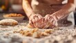 A close-up of hands rolling out whole wheat dough on a floured kitchen counter