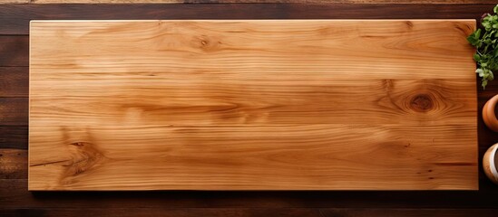 Wall Mural - A top down view of a kitchen table with an empty wooden cutting board offering plenty of copy space for images