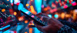 Hands holding and tapping on a mobile phone. Close up image of a person using fintech software. Colorful blurred futuristic bright glowing lights around and in the background. Copyspace for your text.