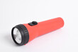 © Mulad Images - Red color flashlight isolated on white background. Red Battery-powered flashlight