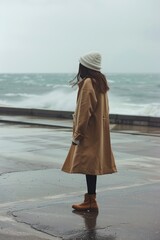 Poster - Woman Standing on Pier by Ocean