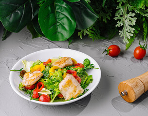 Wall Mural - Grilled chicken with fresh salad at table