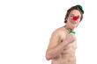Young attractive clown posing on a white background.