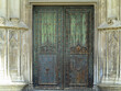 An ancient weathered stylish old wooden door