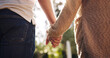 Couple, love and holding hands with back view for relationship, summer and happy date in park. Man, woman and romantic walk together in forest with trust or care for commitment, nature and freedom