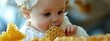 A child eats honey in a honeycomb. Selective focus.