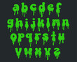 Green slime font. Alphabet with flow drops and slime splashes.  Liquid toxic, radioactive text in zombie style. Vector latin abs. The font is isolated on a dark background.