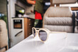 Sunglasses Left on a Table Inside Modern RV Camper Van