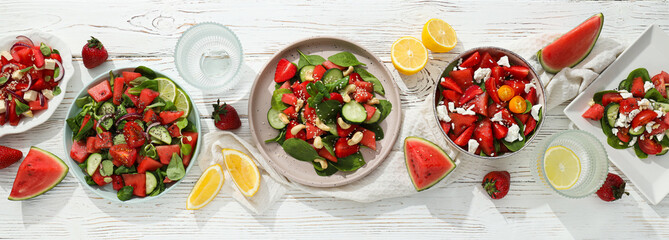 Wall Mural - Watermelon and fresh fruit salad in a bowl on a white background