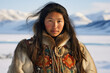 Inuit woman in fur coat against Alaska backdrop