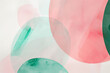 Abstract pink and green shapes on a white background